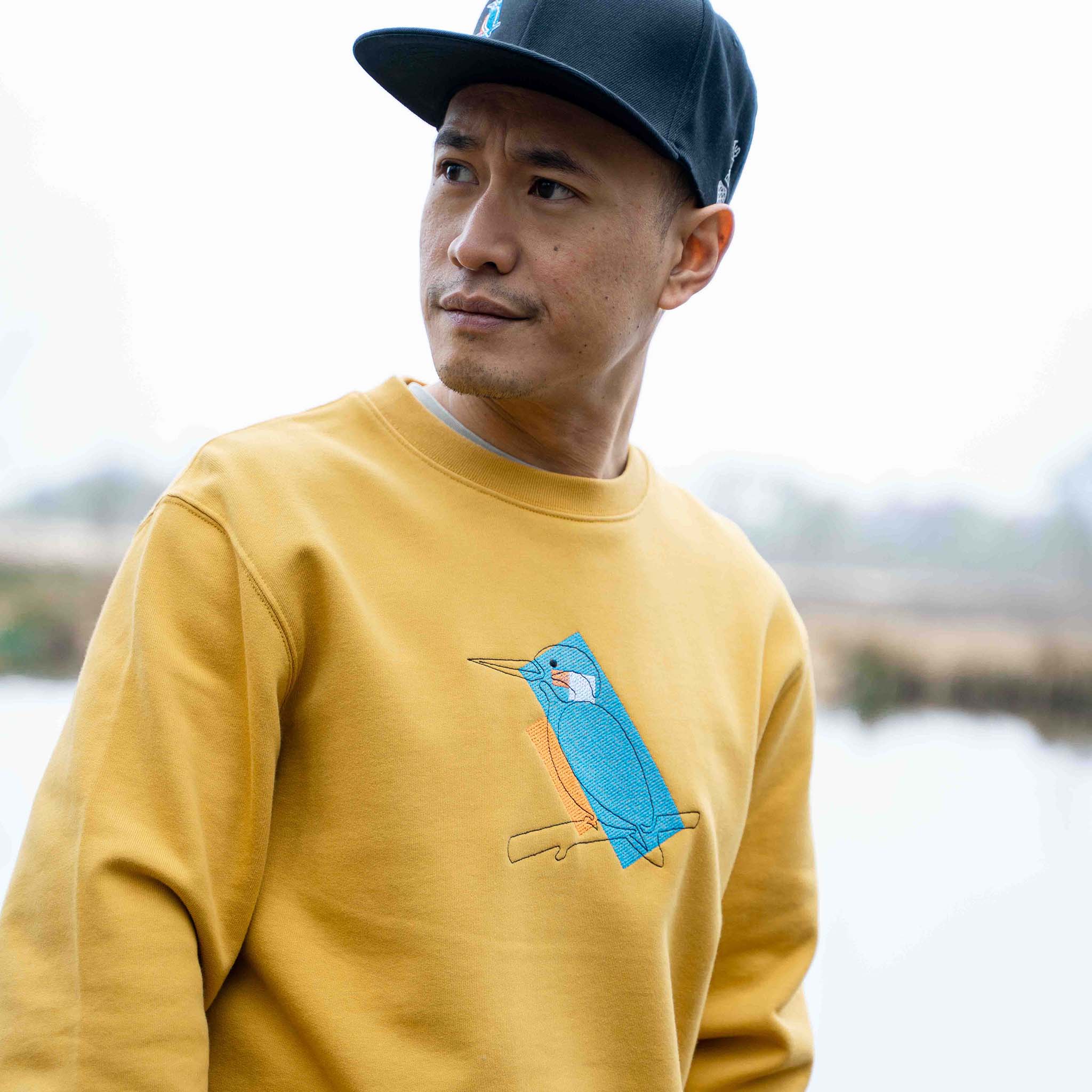 De IJsvogel | Sweater Unisex | Ochre